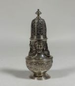 A good George II silver caster base, William Shaw I, London 1731, of baluster form, cast with masks,