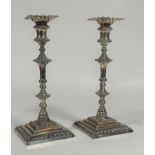 A pair of silver candlesticks in the George II style, James Dixon & Sons, Sheffield 1897, each