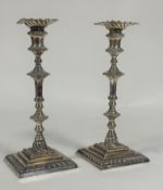 A pair of silver candlesticks in the George II style, James Dixon & Sons, Sheffield 1897, each