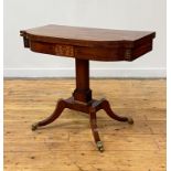 A handsome George IV ebony and brass inlaid mahogany foldover card table, of bowed breakfront