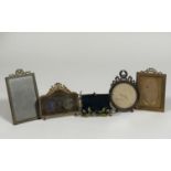 A group of small Edwardian gilt-metal photograph frames comprising: a double aperture frame, the