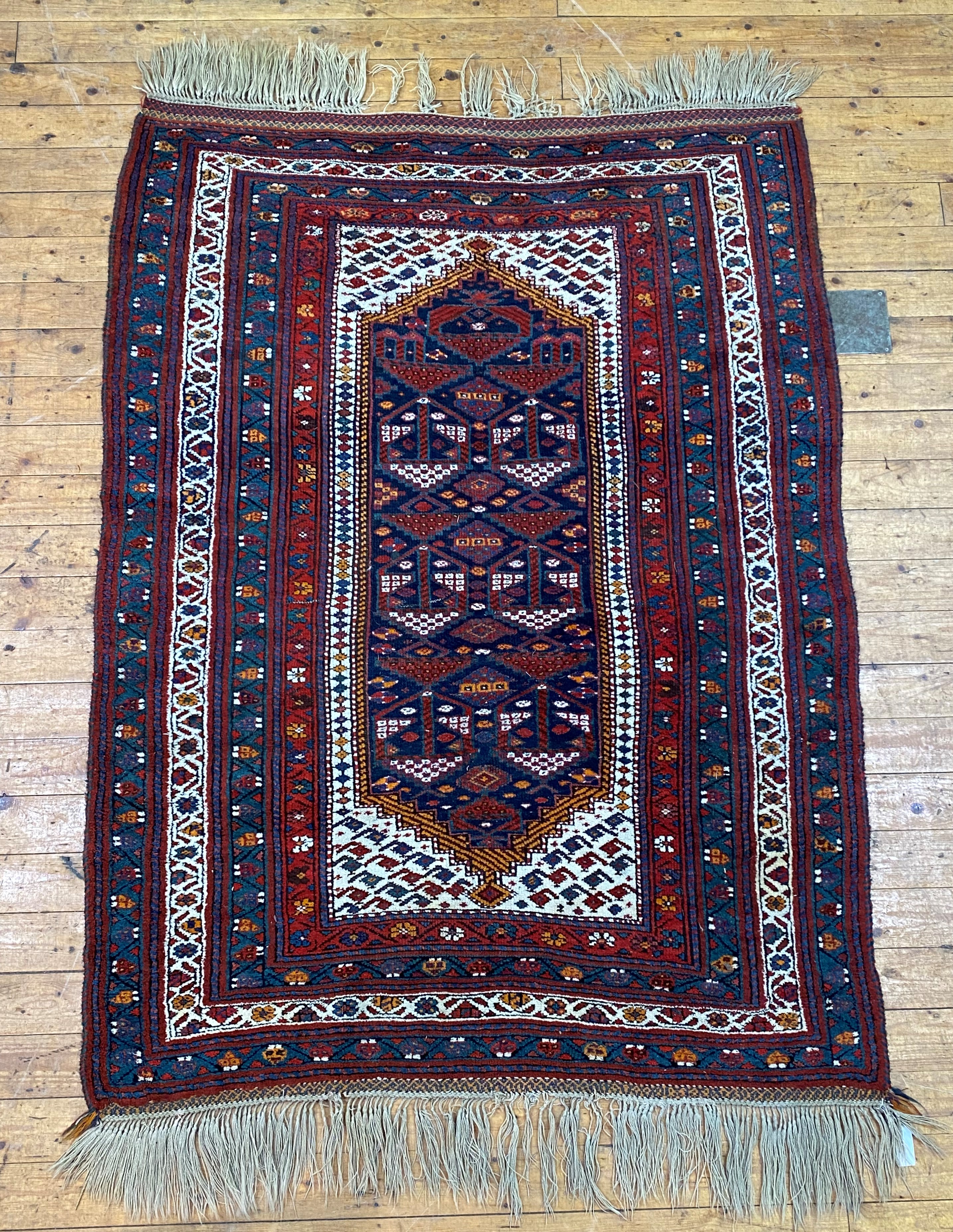 A hand knotted Caucasian rug, of all over geometric design with multiple guard stripes to border - Image 2 of 3