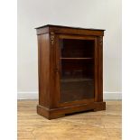 A Victorian walnut pier cabinet, the top with moulded ebonised edge over boxwood strung and