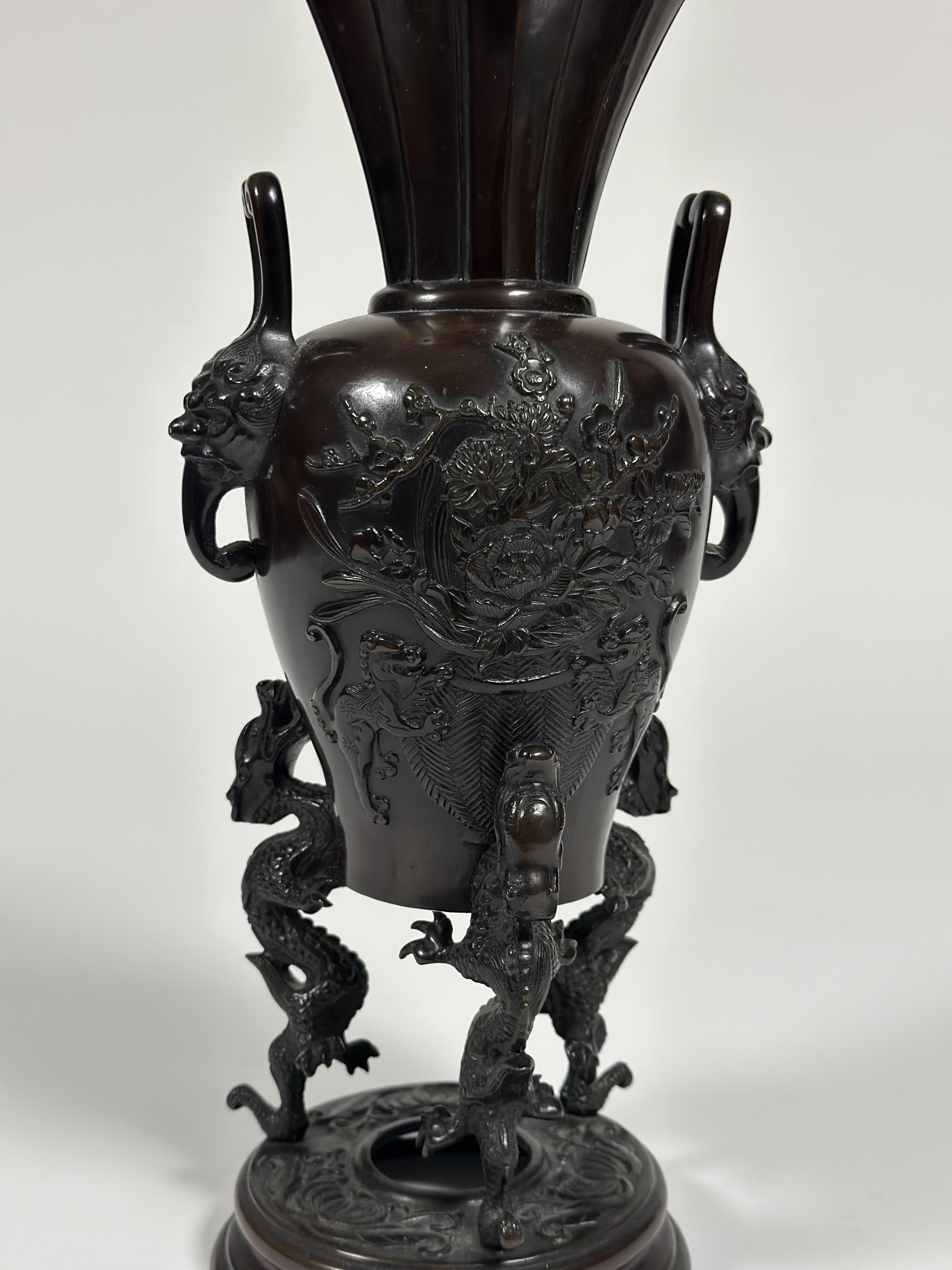 A Japanese bronze tripod censer, Meiji period, of baluster form, the body in relief with baskets - Image 2 of 7
