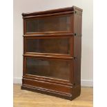 Globe Wernicke, An early 20th century mahogany three height stacking bookcase, each section fitted