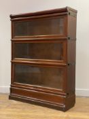 Globe Wernicke, An early 20th century mahogany three height stacking bookcase, each section fitted