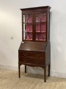 An Edwardian mahogany bureau bookcase, the glazed cabinet top over fall front with fitted