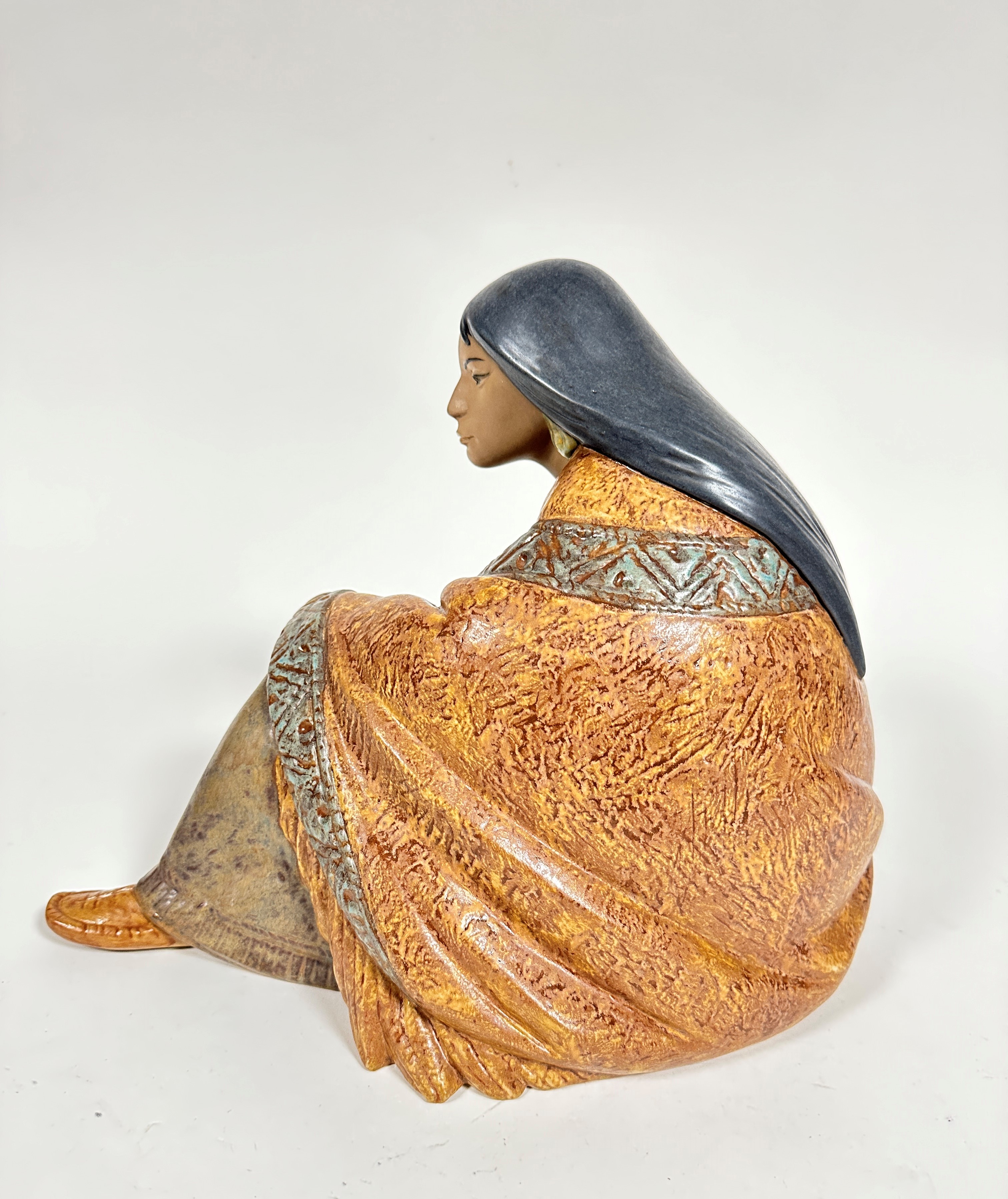 A Spanish Lladro pottery figure of a seated Mexican lady draped with shawl and moccasins, - Image 3 of 5