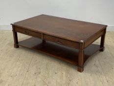 A large Georgian style inlaid mahogany low table, fitted with two frieze drawers, raised on