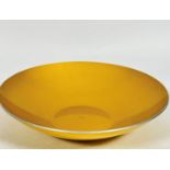 E Malox, Norwegian gold enamelled aluminum mid century fruit bowl, label verso, (h: 6.5cm x 30cm)