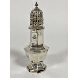 A Chester 1912 silver octagonal pierced dome topped sugar castor raised on stepped base, (h 16.