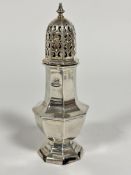 A Chester 1912 silver octagonal pierced dome topped sugar castor raised on stepped base, (h 16.