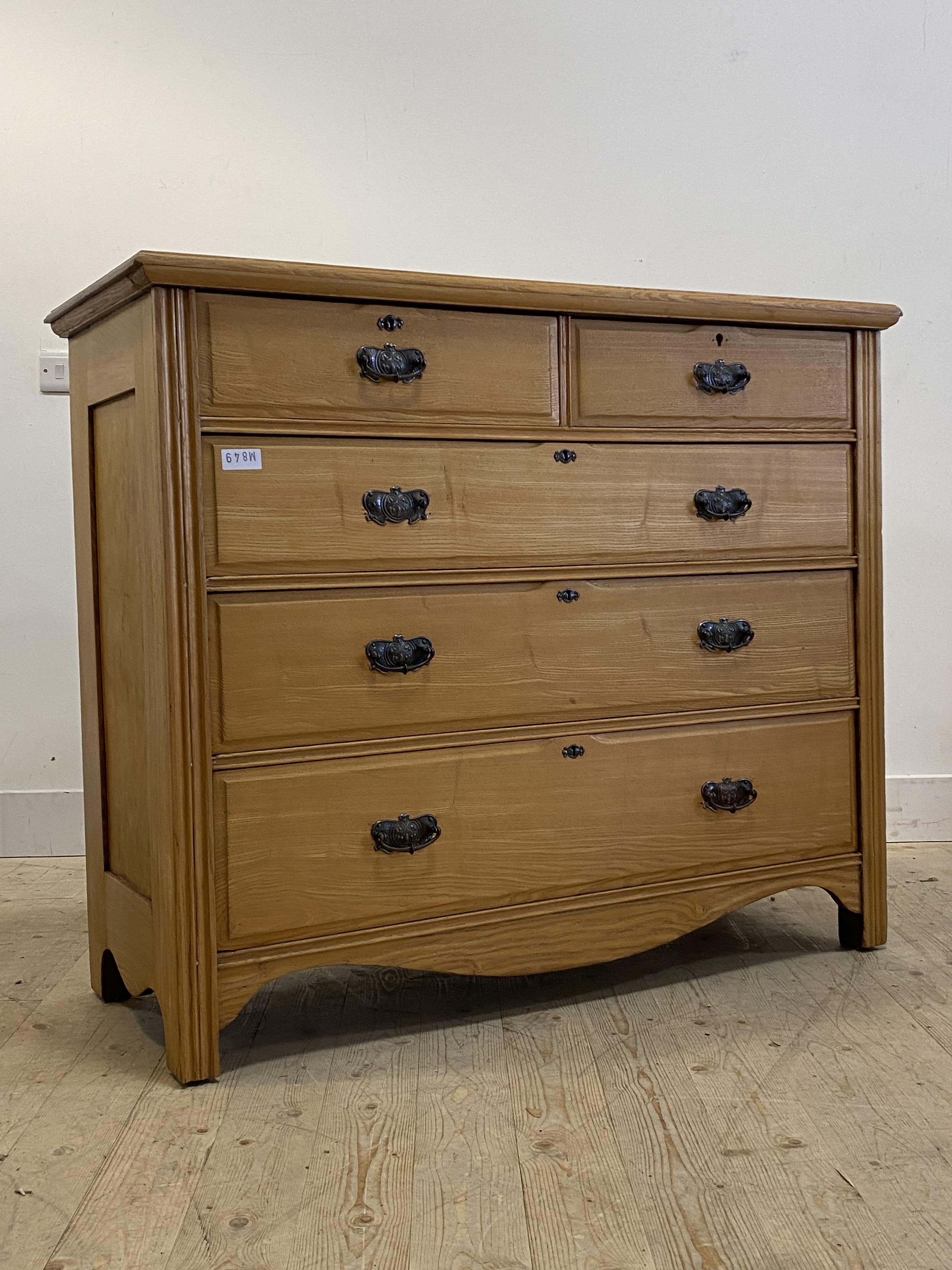 An Edwardian ash chest, fitted with two short and three long graduated drawers, raised on bracket