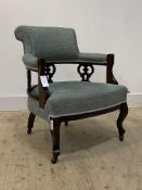 A late Victorian upholstered mahogany bedroom chair, moving on castors, H78cm