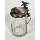 A 19thc German tapered panelled glass tankard with pewter eagle mounted cover with enamelled panel