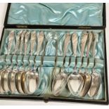 A set of eleven Glasgow Edwardian silver teaspoons with tapered engraved fern leaf handles