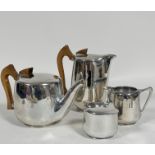 A 1950s / 60s four piece Picquot ware tea and coffee service with beechwood shaped handles to