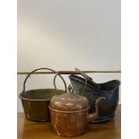 A 19th century hammered brass coal scuttle with swing handle, (H27cm) together with a brass jam pan,