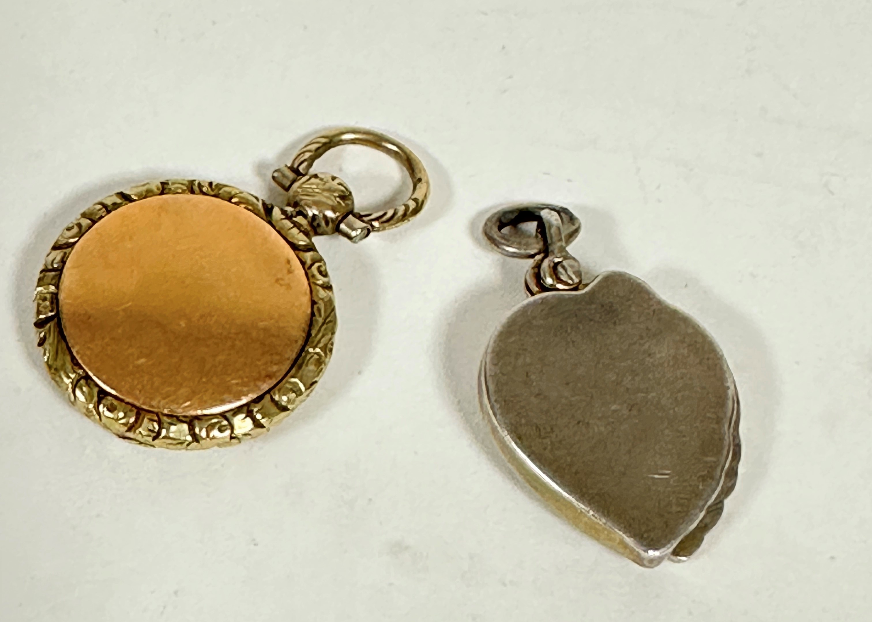 A 19thc yellow metal mounted locket with engraved centre fold down panel with scrolling border and - Image 2 of 3