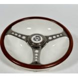 A Beswick, Made for Leston Ltd, sports wheel ashtray in three section, with brown border and