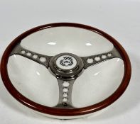 A Beswick, Made for Leston Ltd, sports wheel ashtray in three section, with brown border and