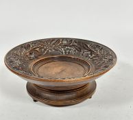 A late 19thc Swiss style treen musical fruit bowl with relief carved border with Edelweiss flowers