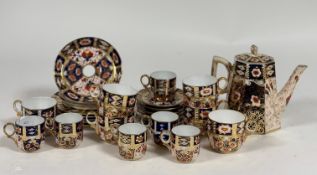 A Davenport Imari pattern part tea service comprising, five plates, three saucers, a tea pot, six