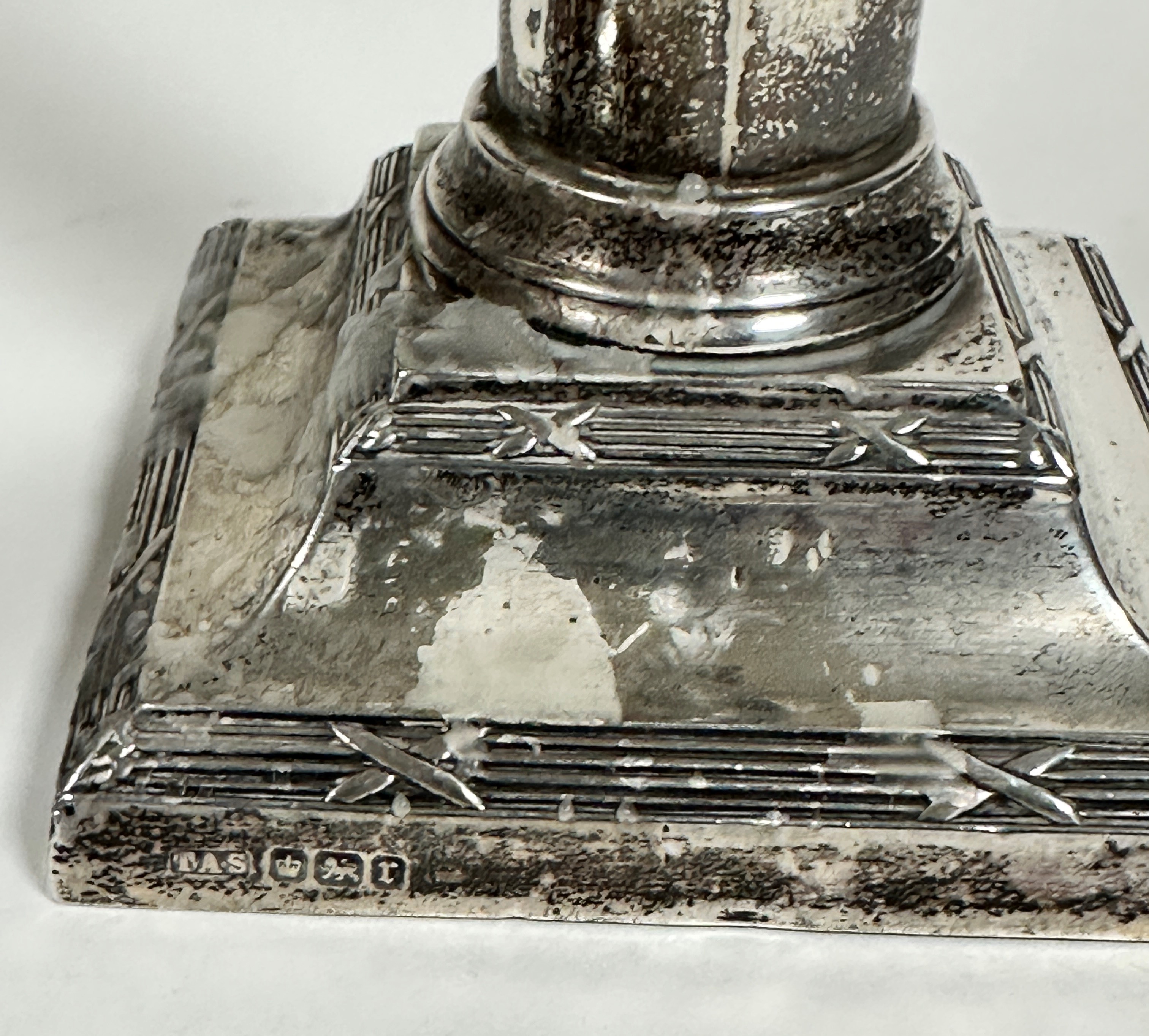 A pair of Edwardian Sheffield silver cast candlesticks of column form on stepped bases with reeded - Image 2 of 4