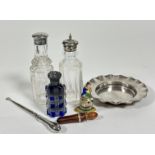 Two Edwardian crystal pepperette condiments with plated tops, (h: 14cm and 13cm) an Epns scalloped