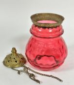 An Edwardian dimpled cranberry glass baluster hall lantern light shade with brass chased mounted top