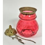An Edwardian dimpled cranberry glass baluster hall lantern light shade with brass chased mounted top