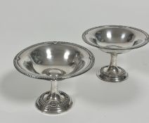 A pair of Edwardian Birmingham 1908 silver Tazzas by Arthur and John Zimmerman, with beaded circular