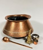 A group of Eastern copper and brassware including a copper flared rim and sided cooking pot with