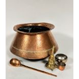 A group of Eastern copper and brassware including a copper flared rim and sided cooking pot with