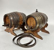 A pair of oak coopered brass port barrels, (including stands h: 27cm x 27cm, bases 26cm) one with