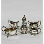 An Epns half lobed oval two piece part tea set including sugar basin and cream ewer (7cm x 10cm), an