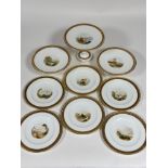 A 19thc nine piece china desert service including two fruit comports ( h- 7 cm), a cake stand (h-