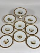 A 19thc nine piece china desert service including two fruit comports ( h- 7 cm), a cake stand (h-