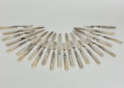 Twelve pairs of mother of pearl handled Epns engraved fruit knives and forks, (L: 18.5c)