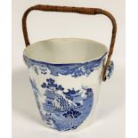 A Mason's ironstone china slop pale with two men on a bridge in blue and white transfer printed