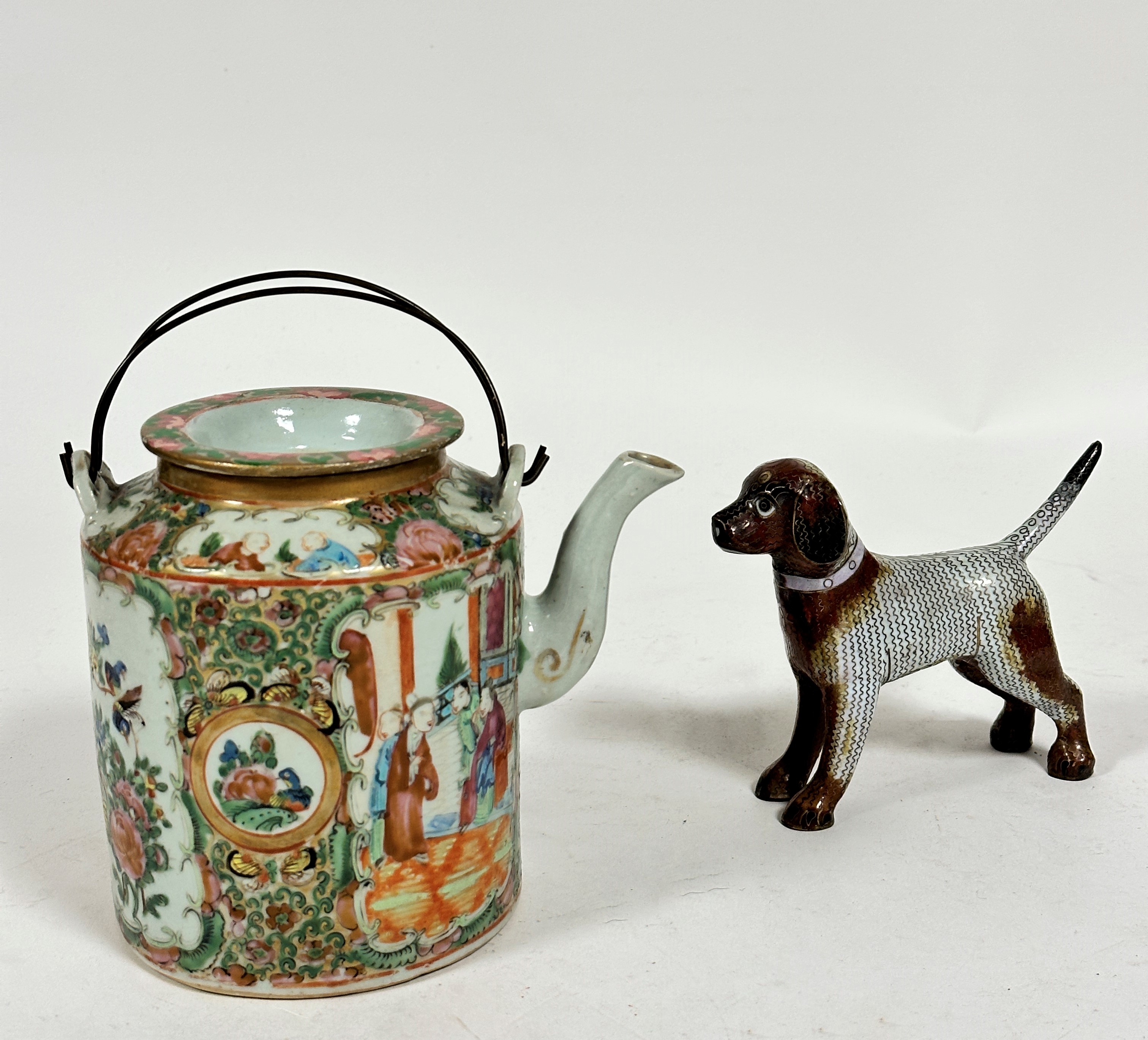 A late 19tch Chinese Canton enamelled cylinder teapot with twin metal handles to top, decorated with