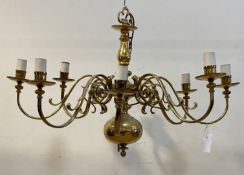 A Dutch style brass chandelier, the central column issuing eight scrolled branches D86cm