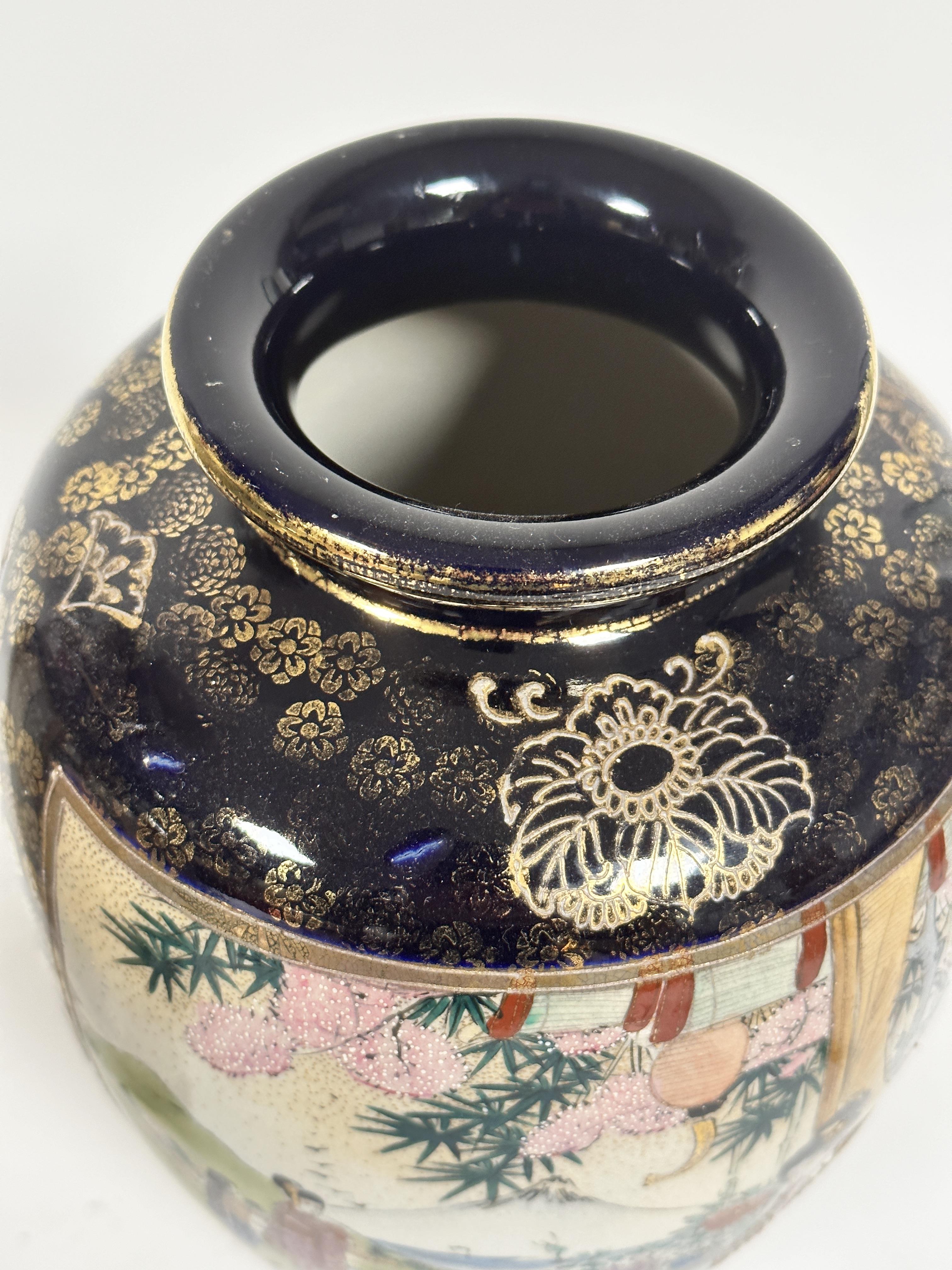 A pair of Japanese Satsuma ovoid tapered vases decorated with scenes in a garden of women playing - Image 5 of 6