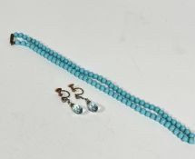 A blue glass child's bead necklace with barrel style fastening, (L: 18cm) and a pair of blue faceted