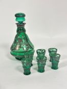 An Italian green glass white metal overlaid baluster shaped decanter complete with stopper, (h