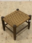 A stained beech foot stool with woven string seat, H24cm
