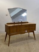 Alfred Cox for AC furntiture, a mid century teak dressing table, the shaped mirror over angular
