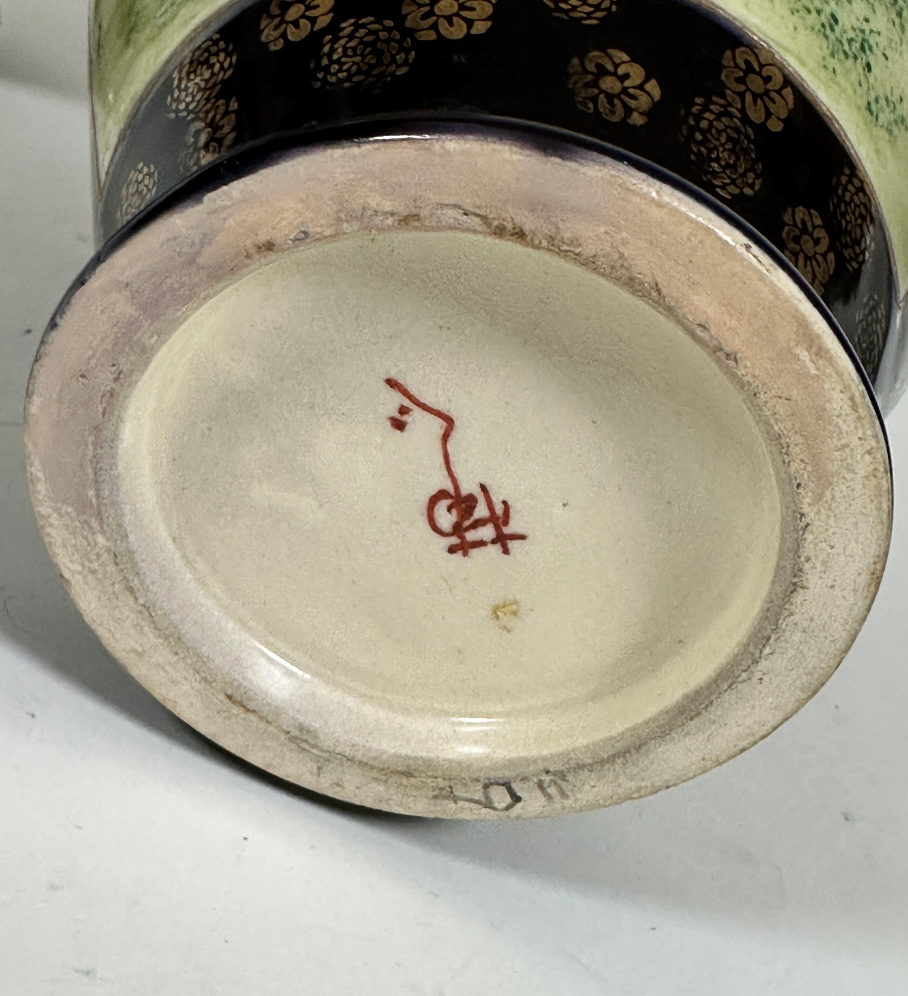 A pair of Japanese Satsuma ovoid tapered vases decorated with scenes in a garden of women playing - Image 2 of 6