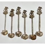 A set of six Sri Lankan white metal teaspoons, each with different shaped leaf bowl, with bird
