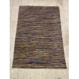 A contemporary wool pile rug of all over polychromatic lineal design, 202cm x 296cm